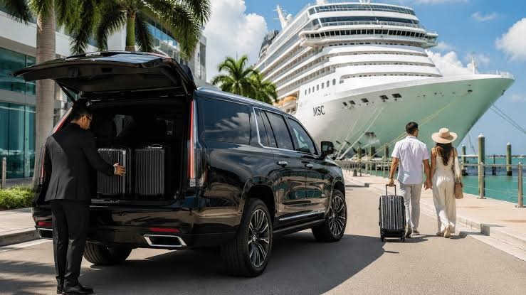 Black luxury SUV parked beside a cruise ship